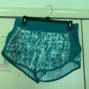 under armor shorts with zip pocket in back